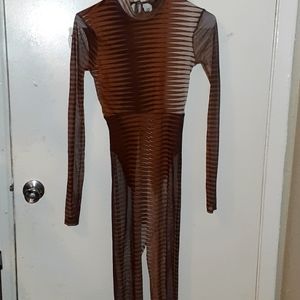 One piece sheer, skin tight romper.